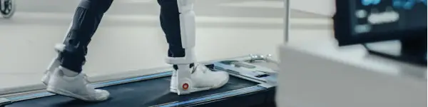 Medical exoskeleton on a treadmill (rehabilitation and gait analysis)
